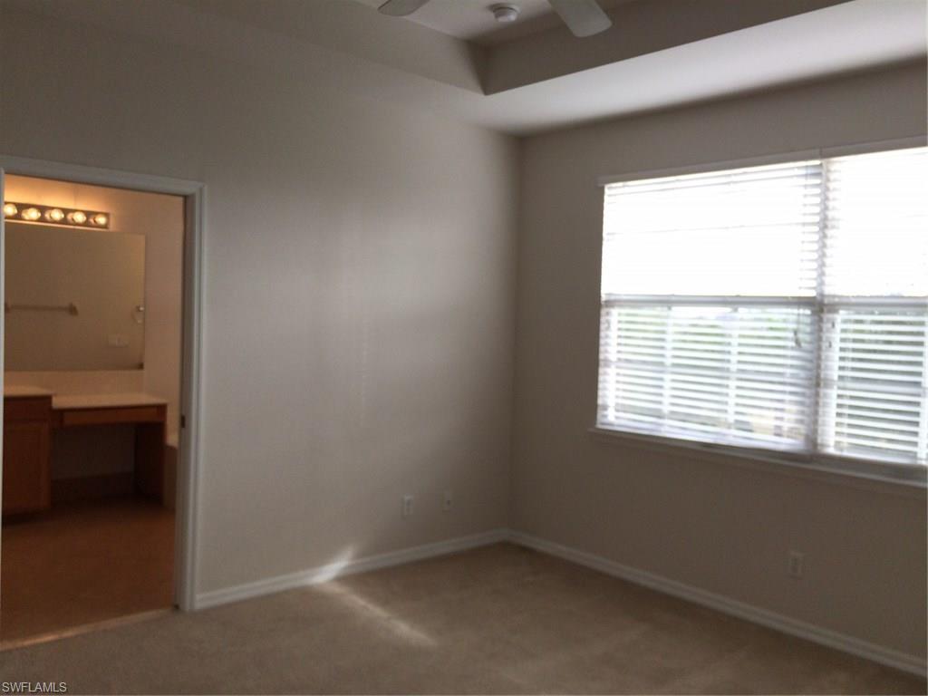 3954 Cherrybrook Loop Fort Myers, FL 33966 - Photo 8 of 16 a room that has a window in it