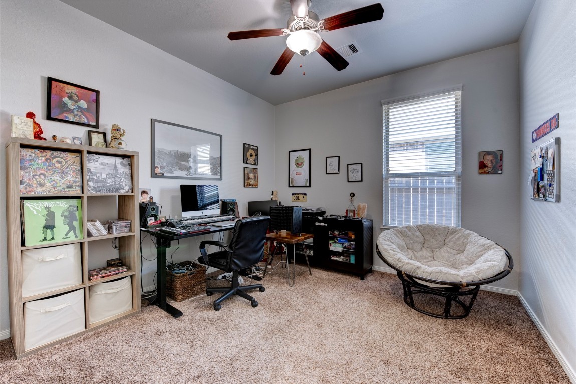 22939 Banff Brook Way Tomball, TX 77375 - Photo 18 of 25 Versatile secondary room with natural light—perfect for a home office, guest room, or flex space.