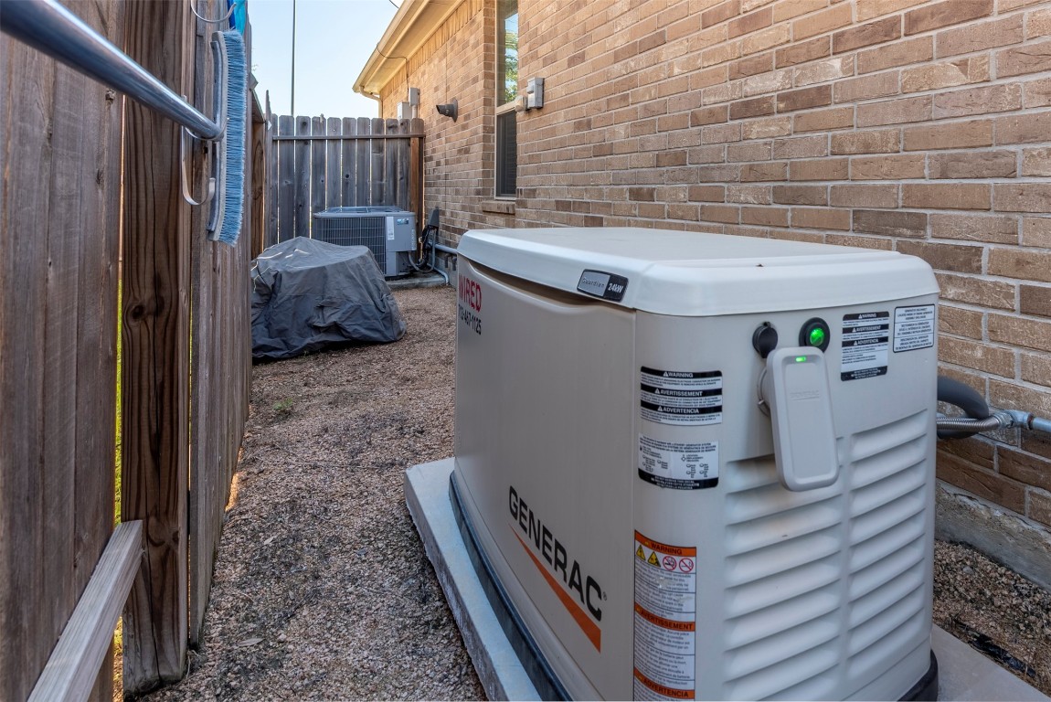 22939 Banff Brook Way Tomball, TX 77375 - Photo 23 of 25 Home equipped with a Generac whole-home generator for added peace of mind and uninterrupted comfort.