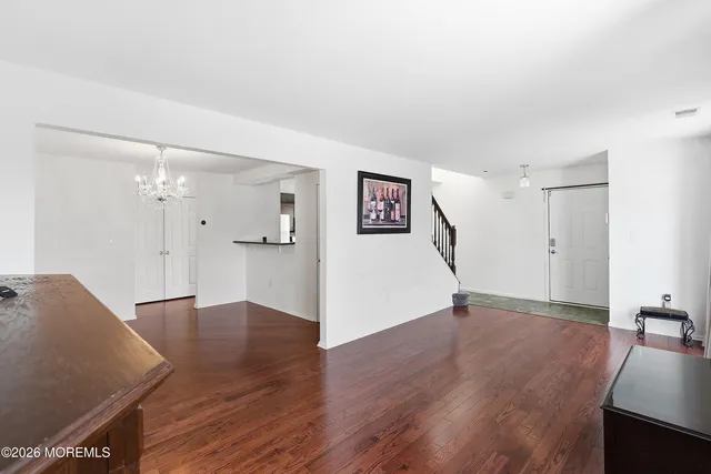 a view of a livingroom with wooden floor