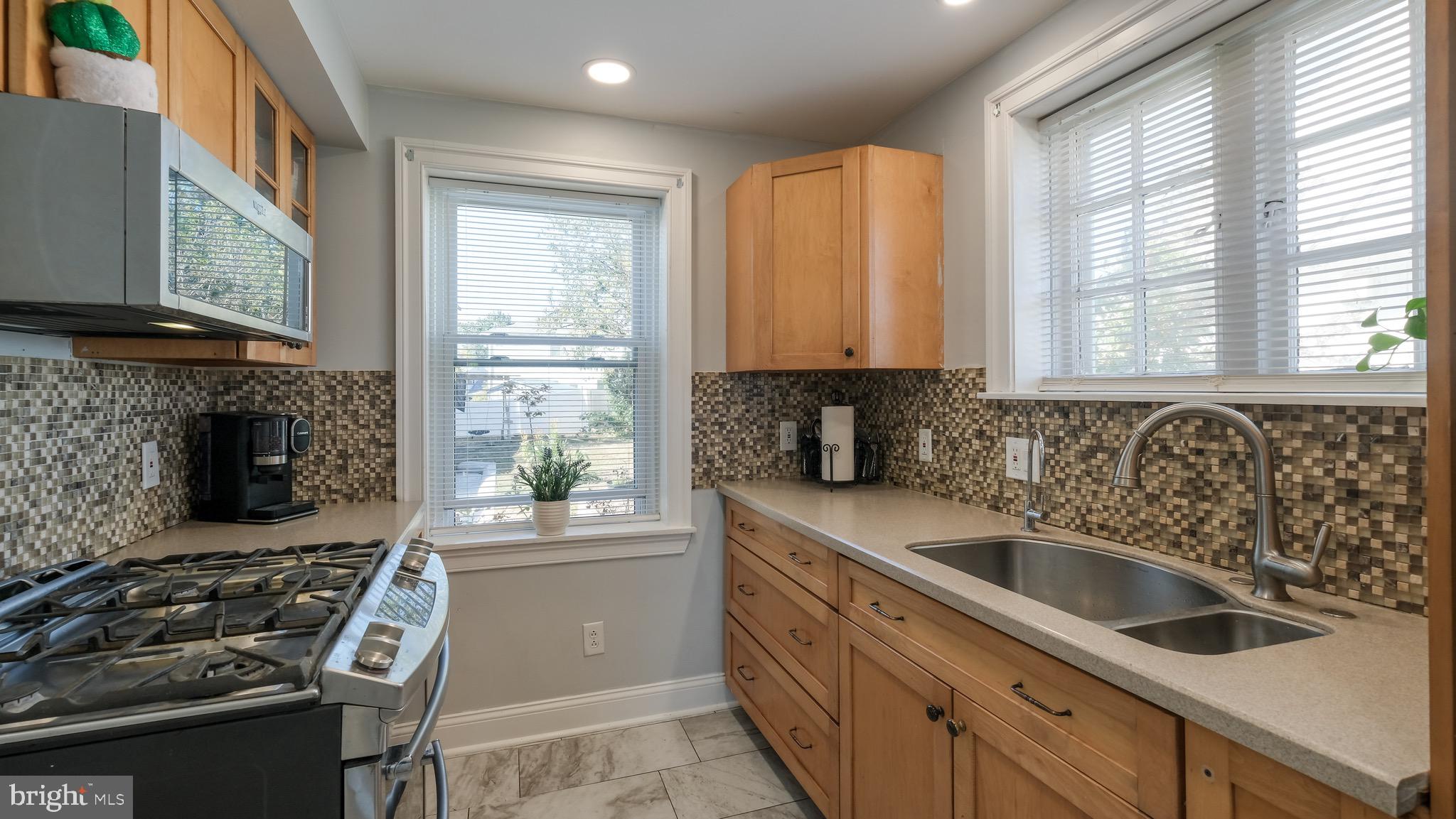 712 North York Road Willow Grove, PA 19090 - Photo 12 of 27 a kitchen that has a sink and a stove
