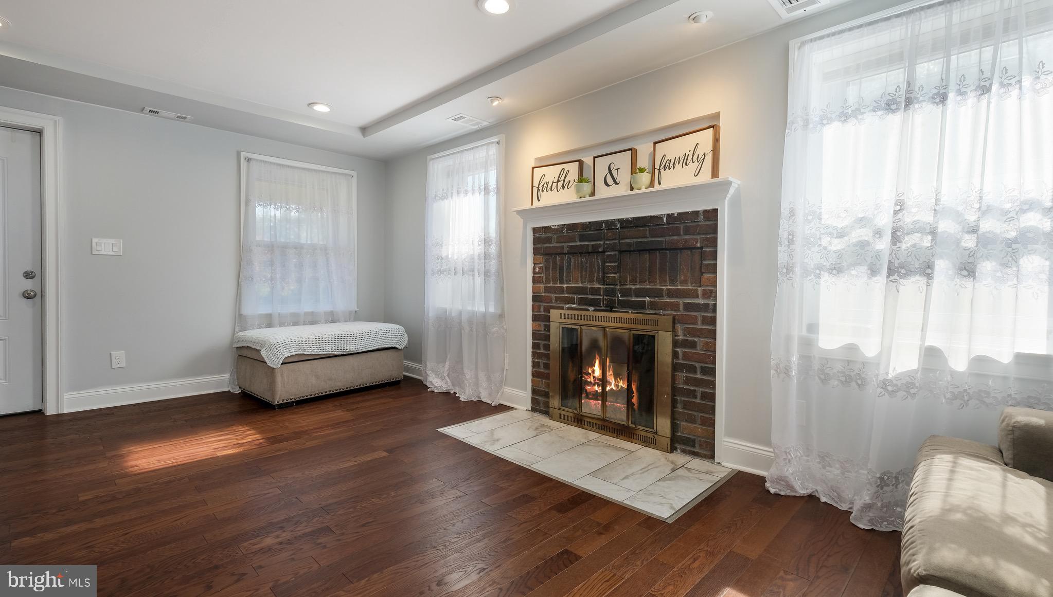 712 North York Road Willow Grove, PA 19090 - Photo 16 of 27 a living room with furniture and a fireplace