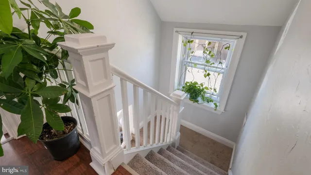 a view of entryway with wooden floor