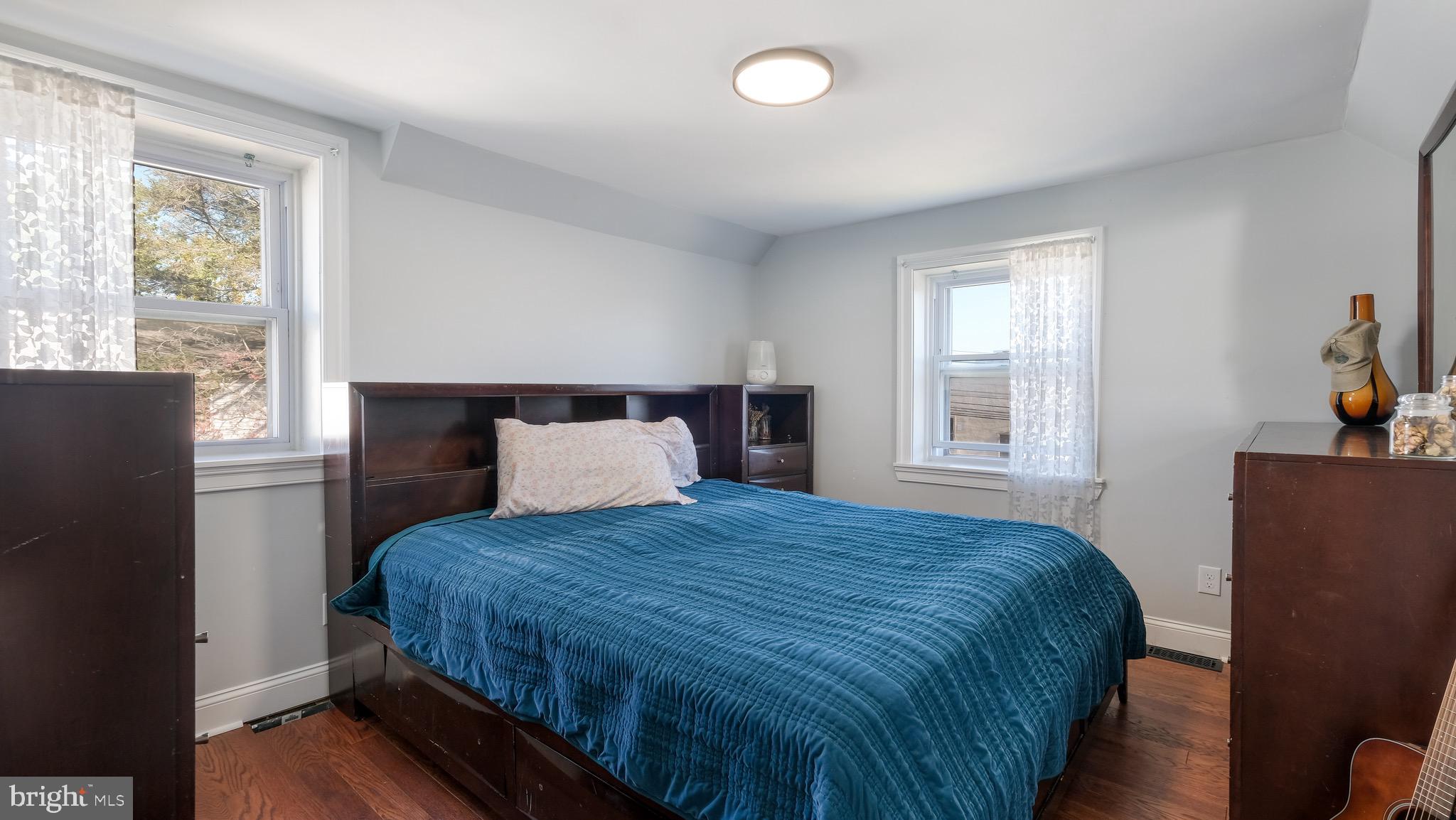 712 North York Road Willow Grove, PA 19090 - Photo 20 of 27 a bedroom with a bed and wooden floor