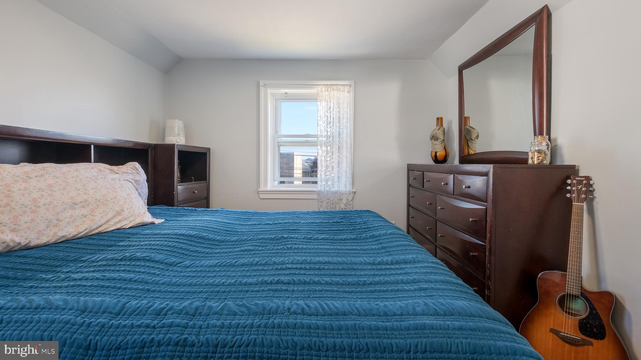 712 North York Road Willow Grove, PA 19090 - Photo 21 of 27 a bedroom with wooden floor and bed