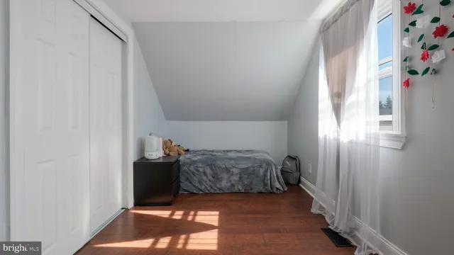 a view of front door and bedroom