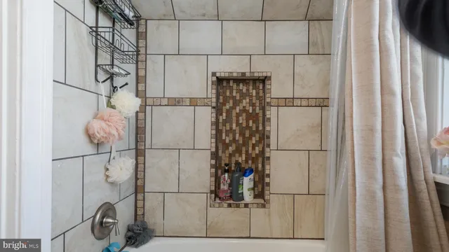 a white refrigerator freezer and a dishwasher with wooden floor