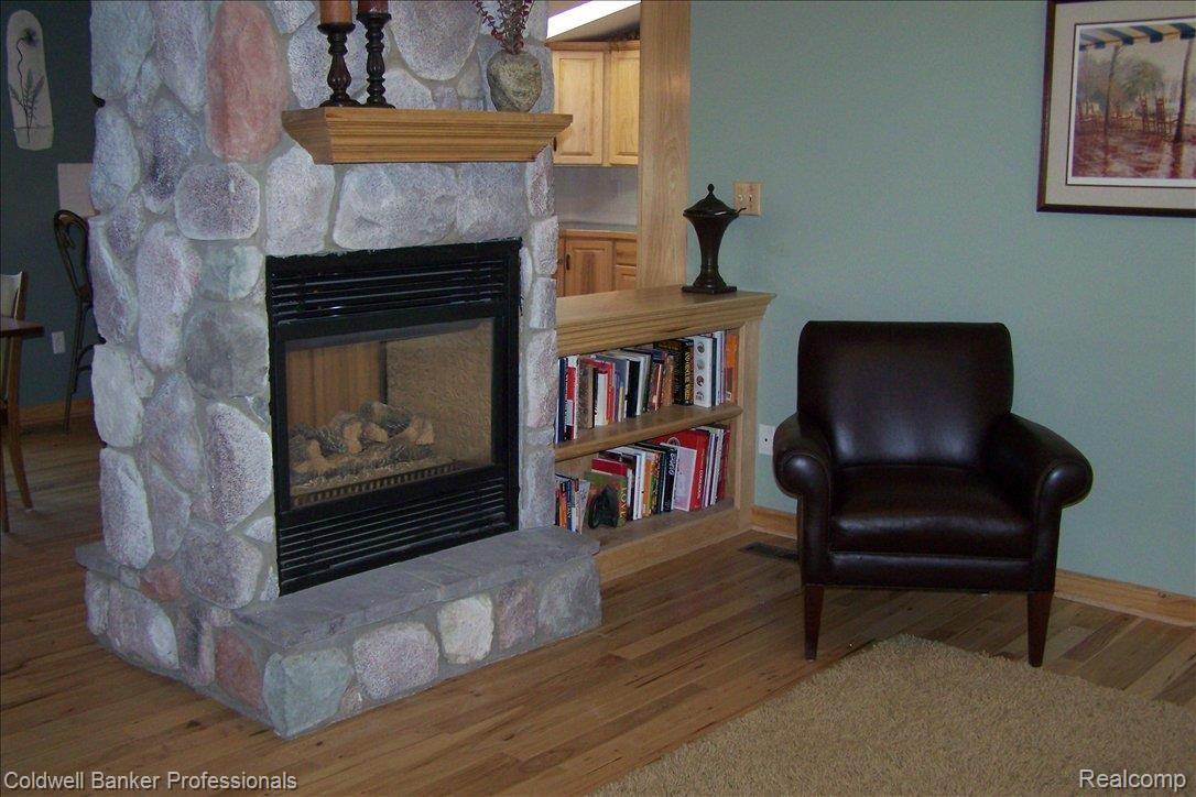 15501 Whitaker Road Linden, MI 48451 - Photo 8 of 22 FIREPLACE IN LIVING ROOM