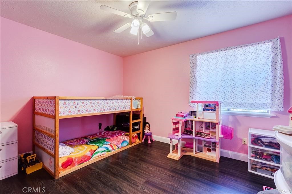 10971 Adobe Road Oak Hills, CA 92344 - Photo 30 of 49 a children room with toys