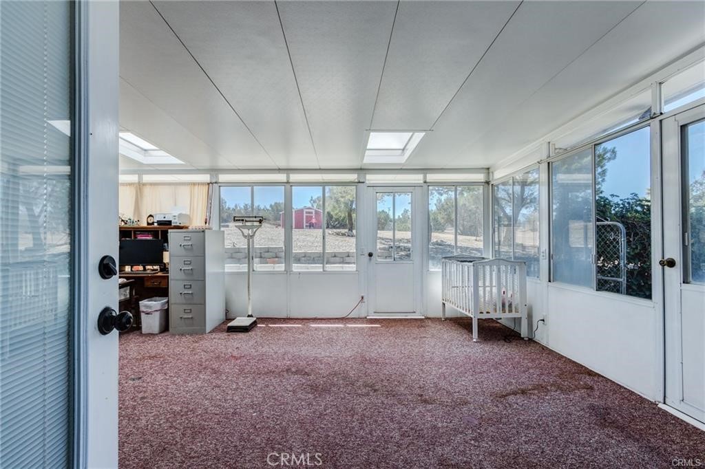 10971 Adobe Road Oak Hills, CA 92344 - Photo 34 of 49 a view of an empty room and a window