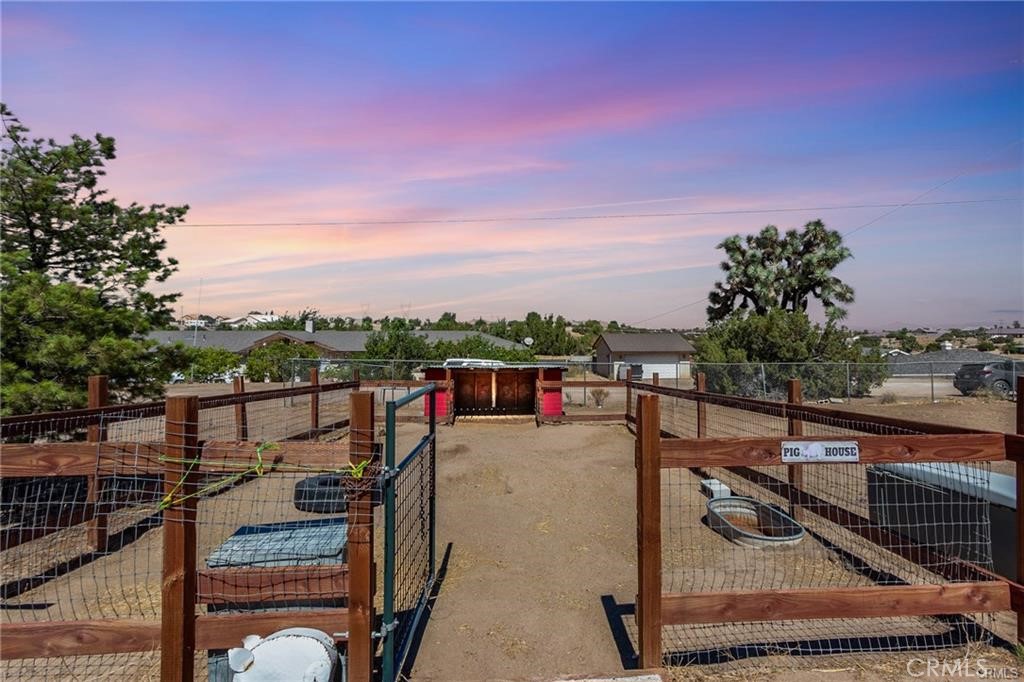 10971 Adobe Road Oak Hills, CA 92344 - Photo 44 of 49 a terrace with outdoor seating and city view