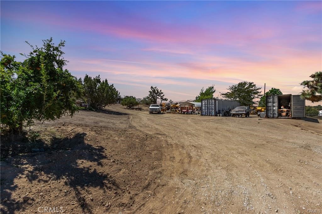 10971 Adobe Road Oak Hills, CA 92344 - Photo 6 of 49 a view of outdoor space with trees