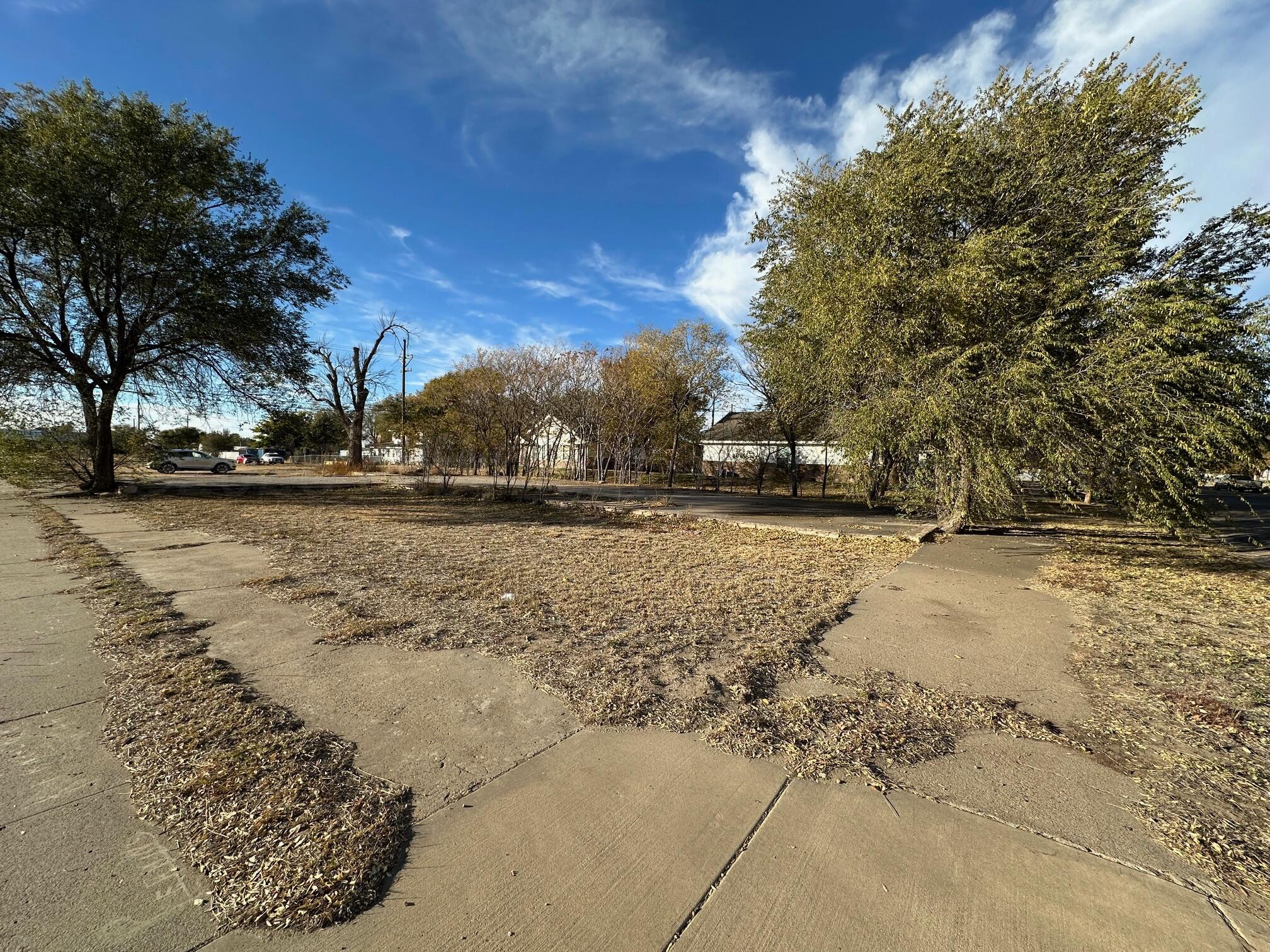 410 Southwest 3rd Avenue Amarillo, TX 79101 - Photo 6 of 8 a view of dirt yard with a tree