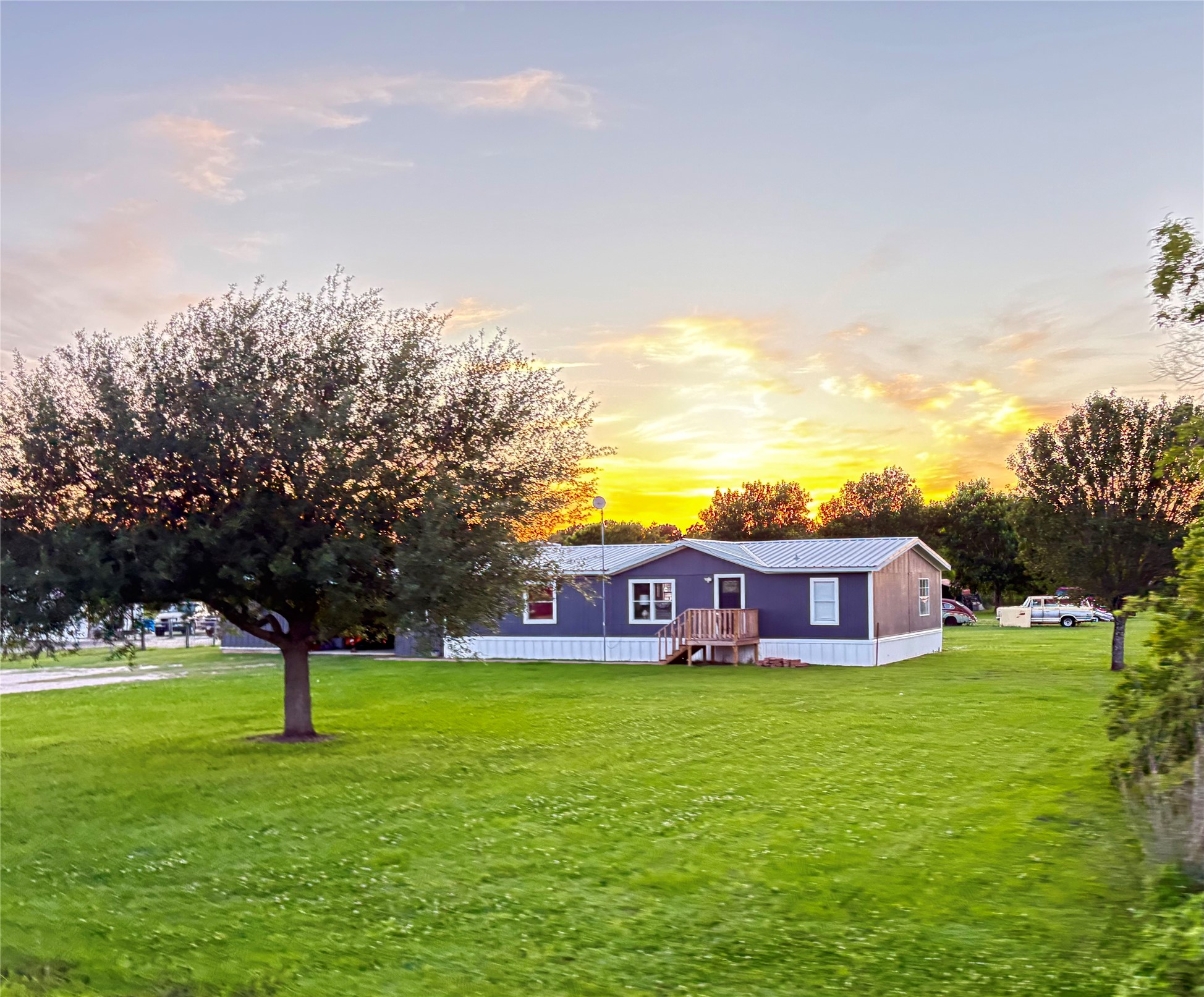 9062 Drachenberg Road Beasley, TX 77417 - Photo 1 of 7 a view of a house with a big yard