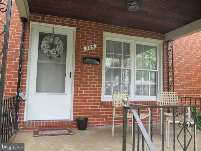 905 Southridge Road Catonsville, MD 21228 - Photo 6 of 14 a front view of a house with a window