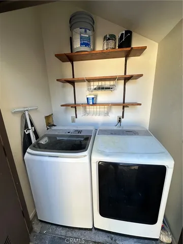 a utility room with washer and dryer