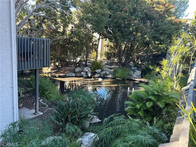 a view of a lake with sitting area