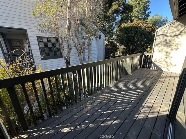 a view of balcony with furniture
