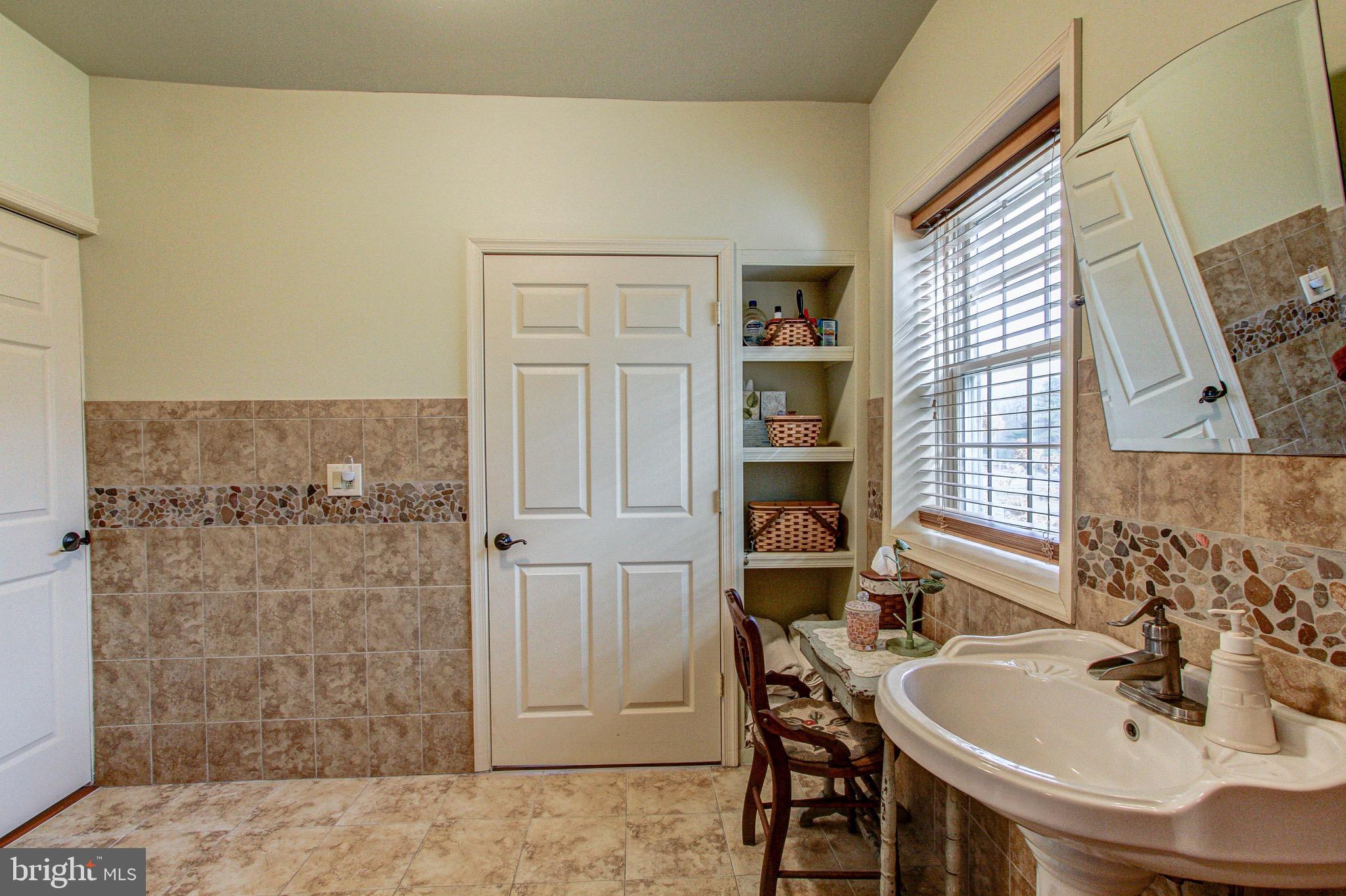 2613 Hill Road Green Lane, PA 18054 - Photo 118 of 146 Built-in shelves and door to bedroom.