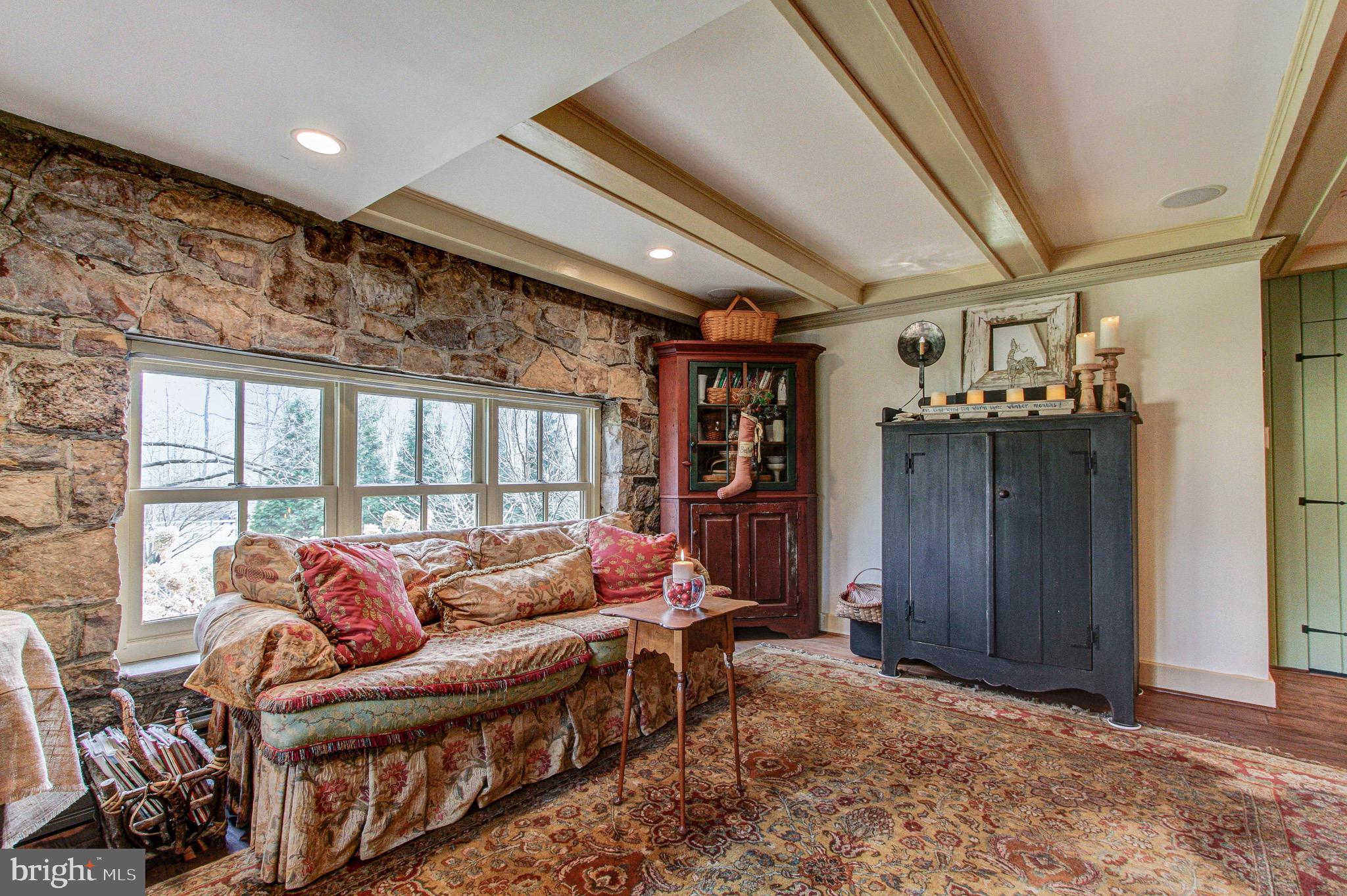 2613 Hill Road Green Lane, PA 18054 - Photo 14 of 146 Warm and bright living room with beamed ceiling