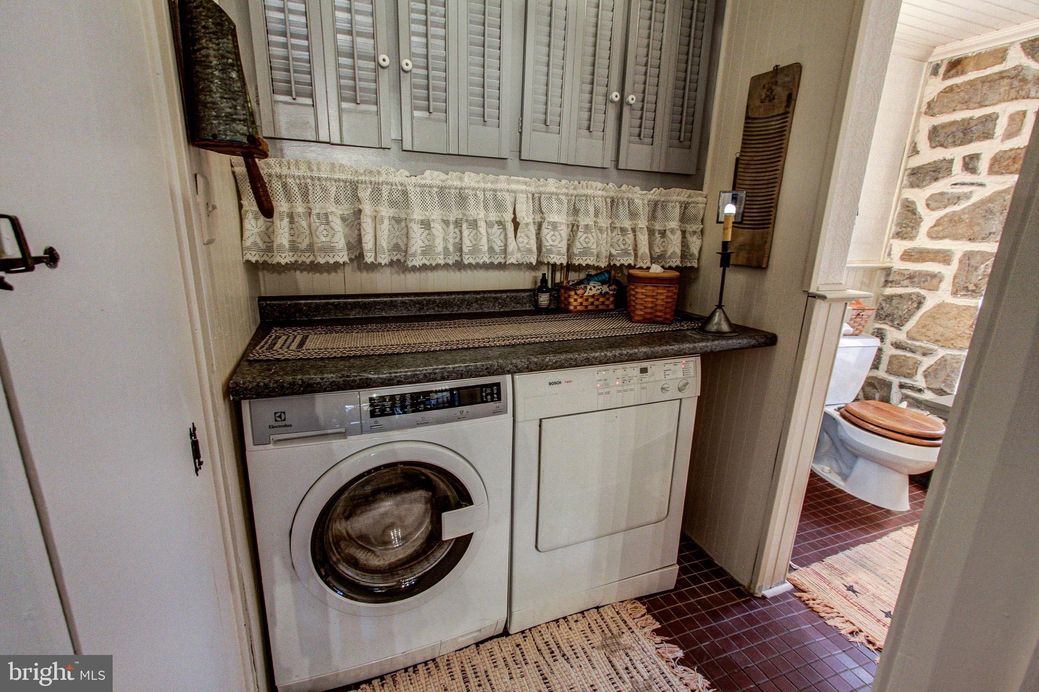 2613 Hill Road Green Lane, PA 18054 - Photo 68 of 146 Folding area and storage in laundry / powder room