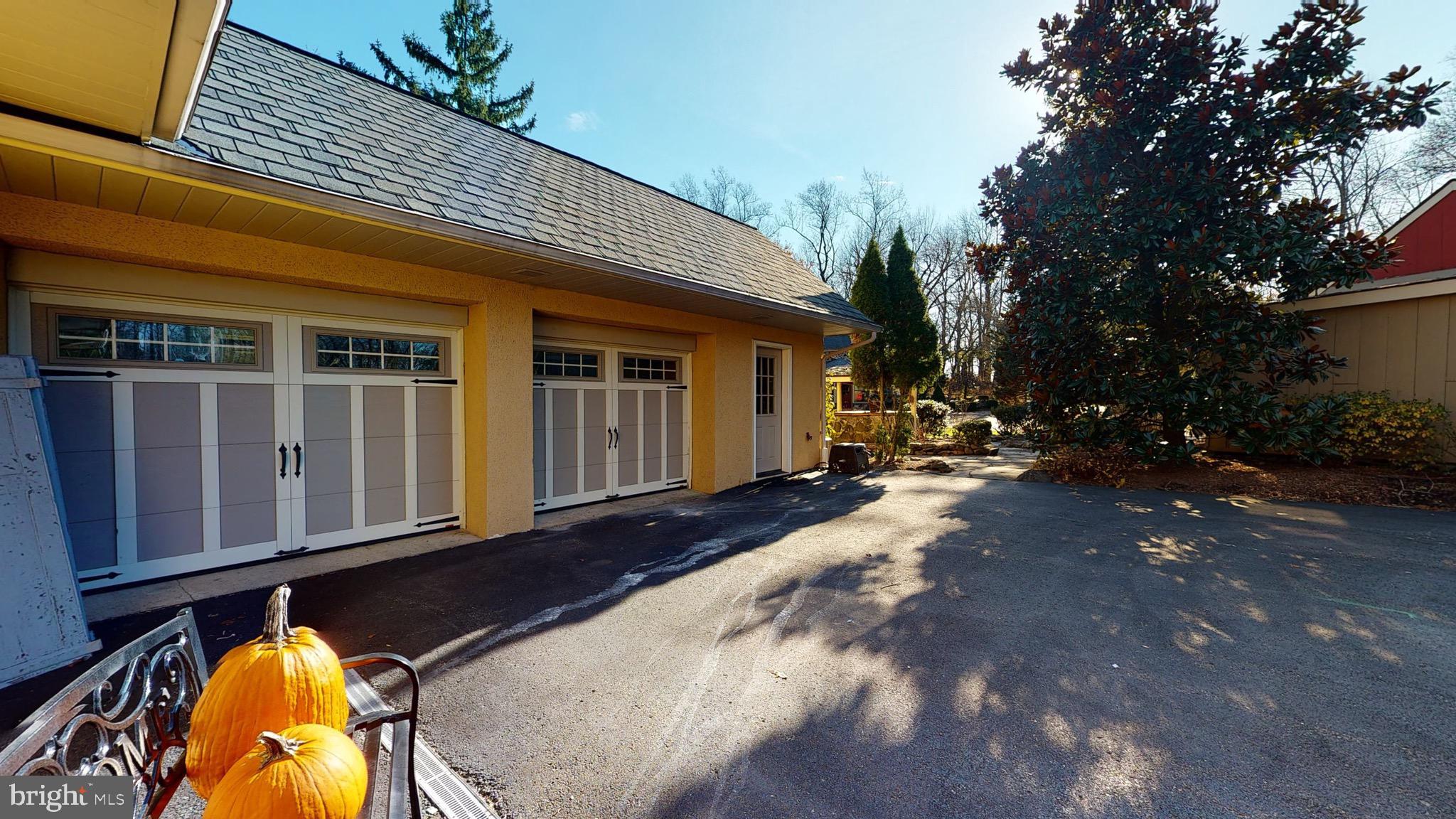 2613 Hill Road Green Lane, PA 18054 - Photo 89 of 146 Two garage doors and side door entry to workshop