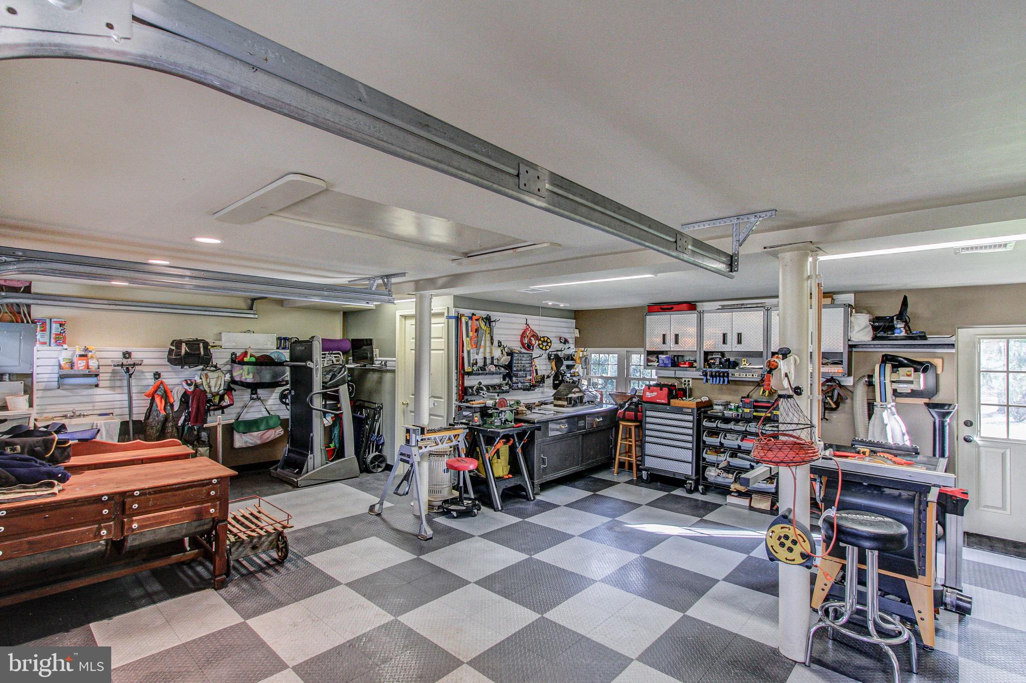 2613 Hill Road Green Lane, PA 18054 - Photo 90 of 146 Gladiator flooring and fabulous workspace!