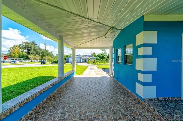 a view of swimming pool with a yard