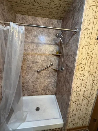 a bathroom with a toilet and a sink