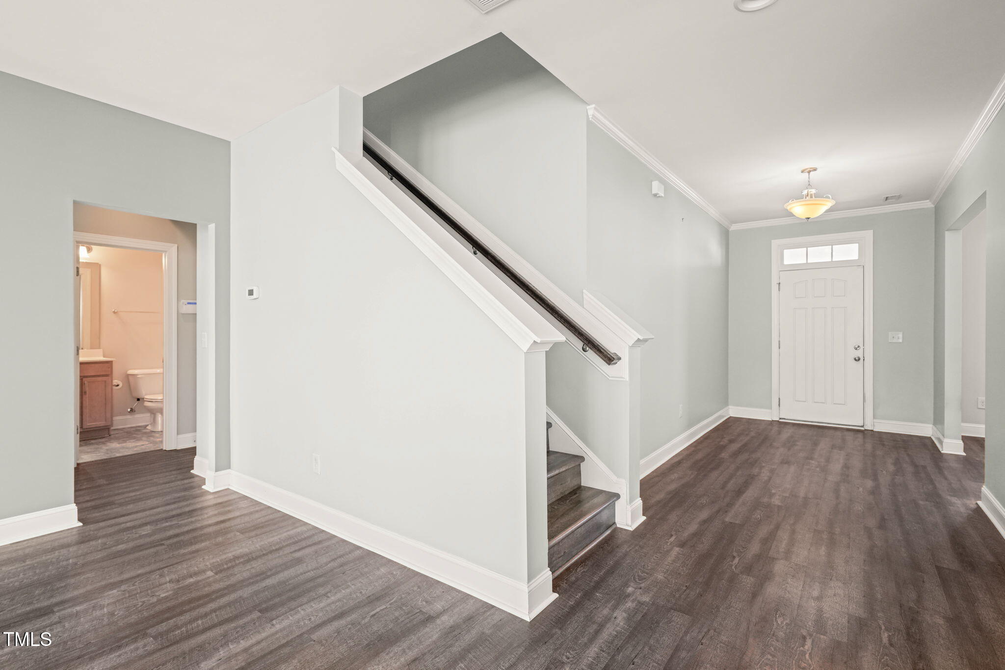 4508 Brintons Cottage Street Raleigh, NC 27616 - Photo 19 of 46 a view of entryway with wooden floor