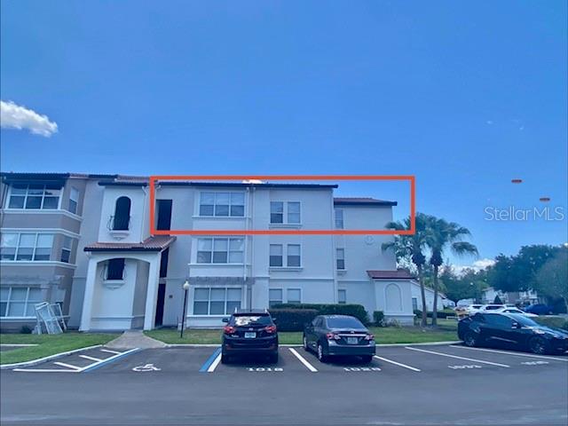 5144 Conroy Road, Unit 38 Orlando, FL 32811 - Photo 1 of 49 a car parked in front of a building