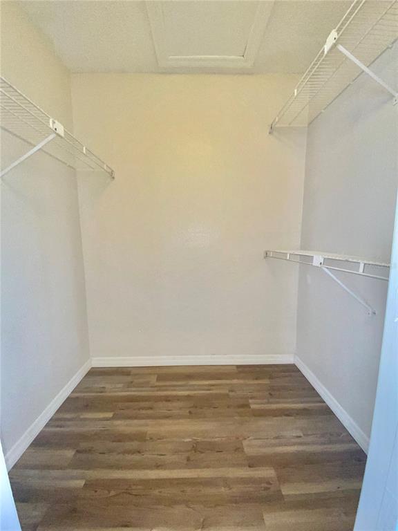 5144 Conroy Road, Unit 38 Orlando, FL 32811 - Photo 22 of 49 a view of an empty walk in closet