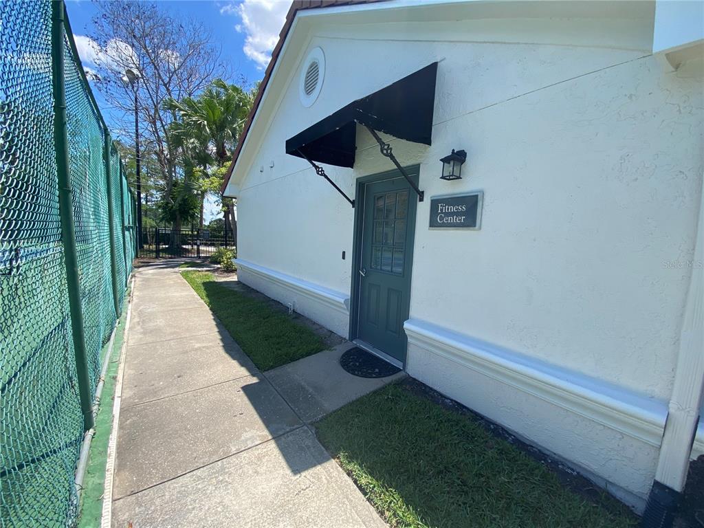 5144 Conroy Road, Unit 38 Orlando, FL 32811 - Photo 33 of 49 a view of house with backyard
