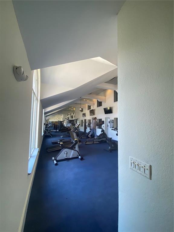 5144 Conroy Road, Unit 38 Orlando, FL 32811 - Photo 35 of 49 a view of a room with gym equipment