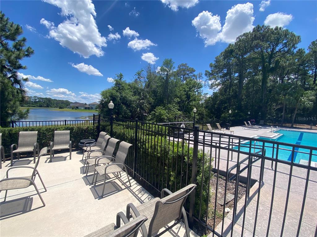 5144 Conroy Road, Unit 38 Orlando, FL 32811 - Photo 39 of 49 a view of a chairs and tables in the balcony
