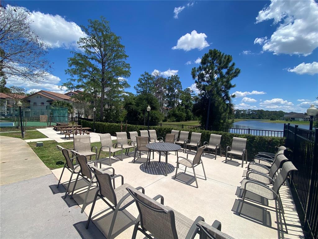5144 Conroy Road, Unit 38 Orlando, FL 32811 - Photo 40 of 49 a view of a patio with iron fence
