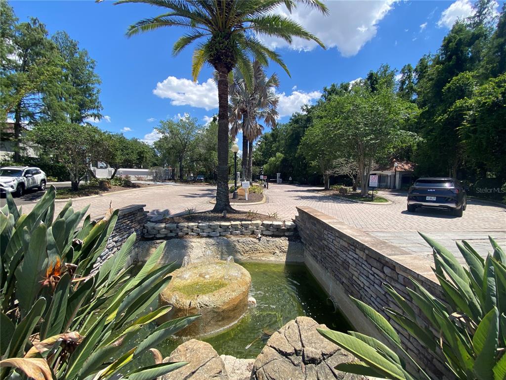 5144 Conroy Road, Unit 38 Orlando, FL 32811 - Photo 43 of 49 a view of a swimming pool with a patio