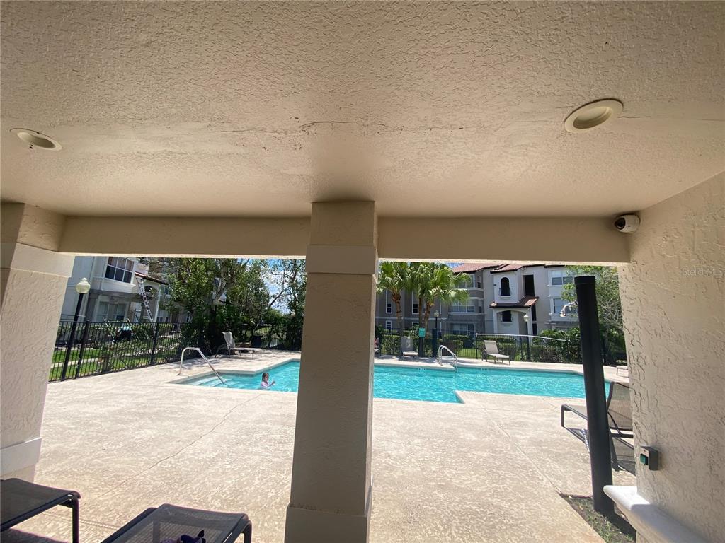 5144 Conroy Road, Unit 38 Orlando, FL 32811 - Photo 46 of 49 a view of a backyard