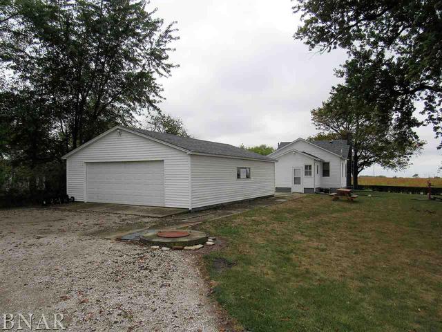 6972 Red Road Clinton, IL 61727 - Photo 2 of 17 a house with trees in front of it