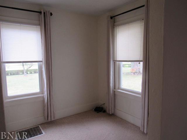6972 Red Road Clinton, IL 61727 - Photo 13 of 17 a view of an empty room and a window