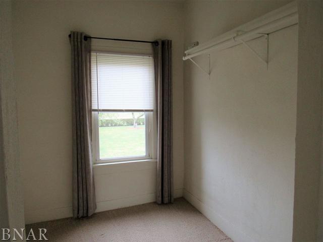 6972 Red Road Clinton, IL 61727 - Photo 14 of 17 a view of an empty room with a window