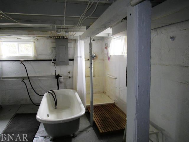 6972 Red Road Clinton, IL 61727 - Photo 17 of 17 a bathroom with a sink toilet and shower