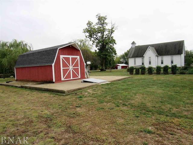 6972 Red Road Clinton, IL 61727 - Photo 4 of 17 a view of outdoor space with garden and trees