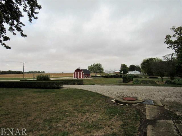 6972 Red Road Clinton, IL 61727 - Photo 8 of 17 a view of a lake with houses in the background