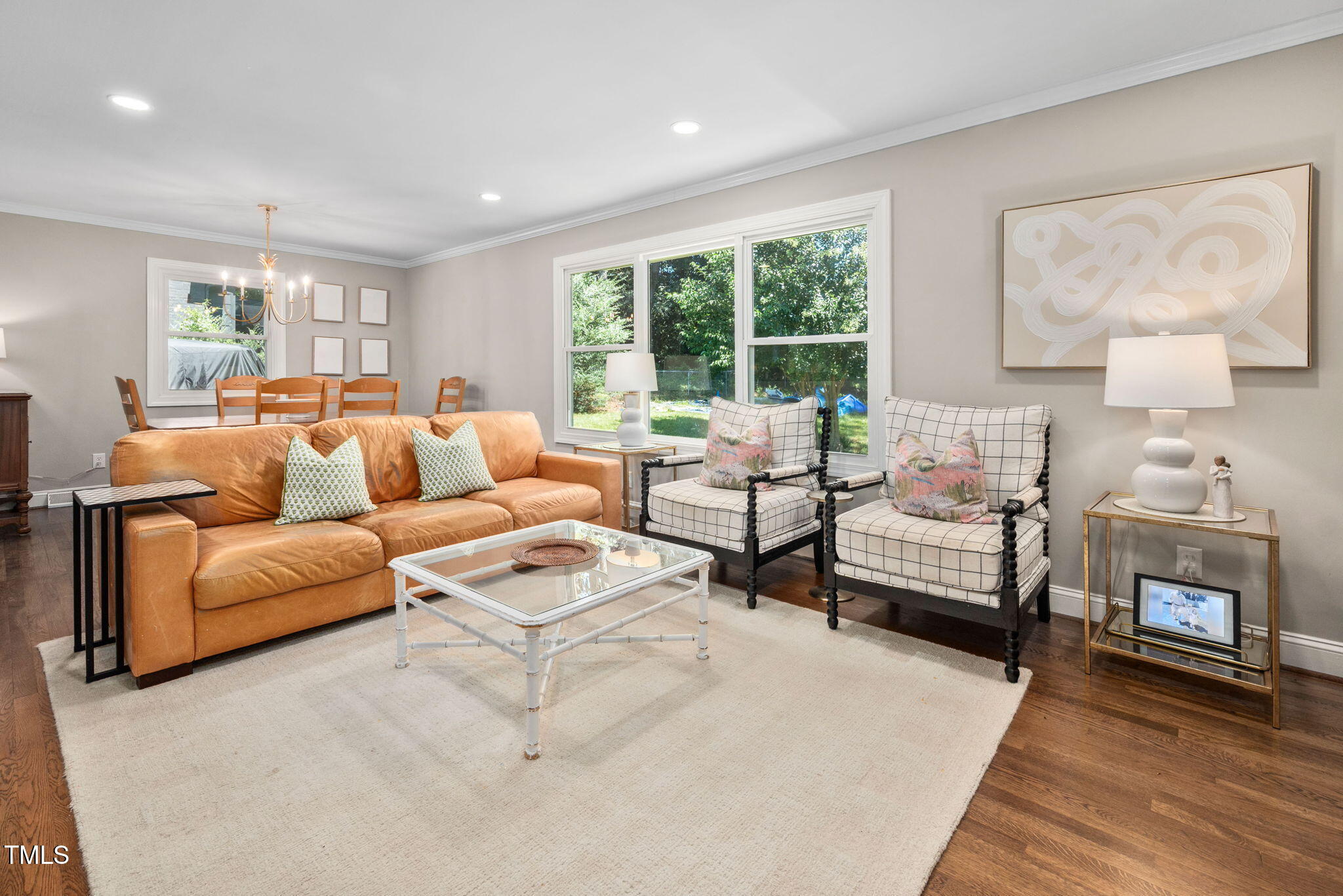 4808 Latimer Road Raleigh, NC 27609 - Photo 9 of 39 a living room with furniture and a fireplace