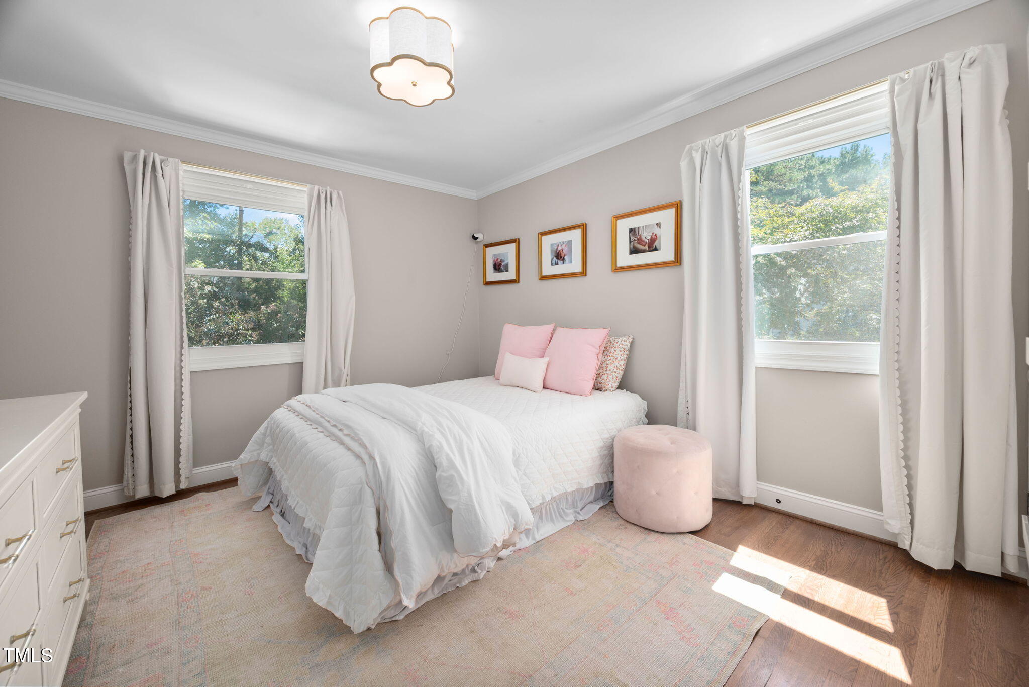 4808 Latimer Road Raleigh, NC 27609 - Photo 19 of 39 a bedroom with a bed and a window