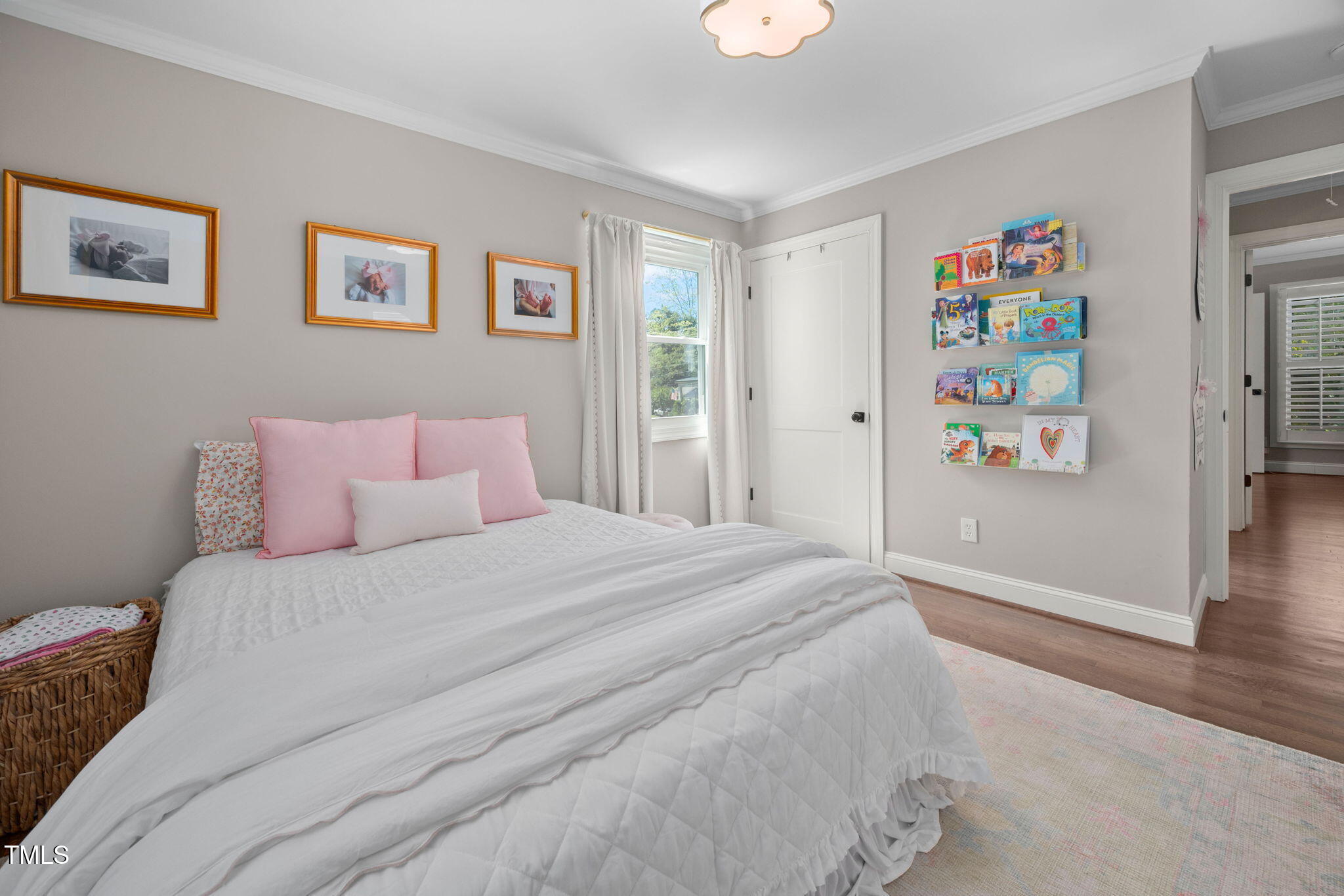 4808 Latimer Road Raleigh, NC 27609 - Photo 20 of 39 a bedroom with a bed and a window