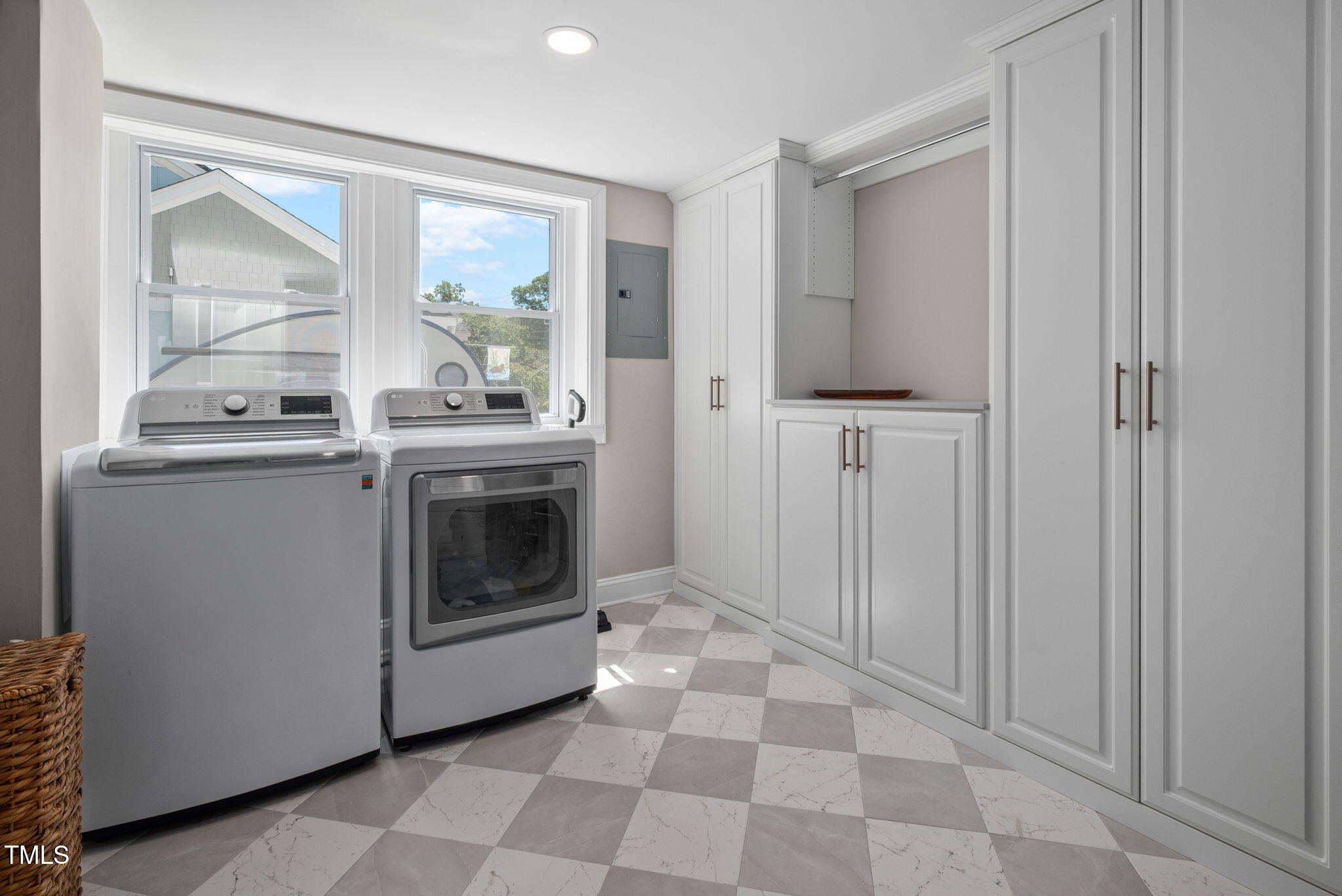 4808 Latimer Road Raleigh, NC 27609 - Photo 25 of 39 a view of a kitchen with washer and dryer