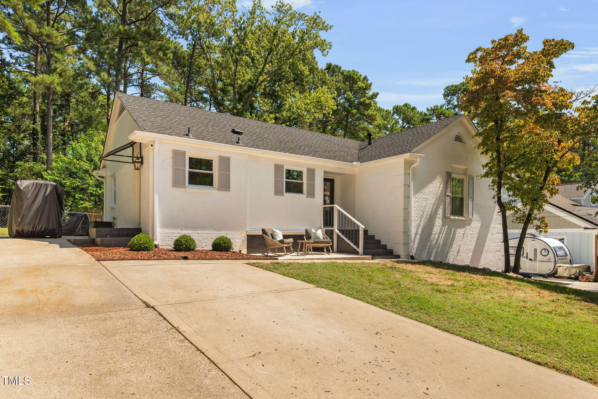 4808 Latimer Road Raleigh, NC 27609 - Photo 2 of 39 a front view of house with yard and trees around