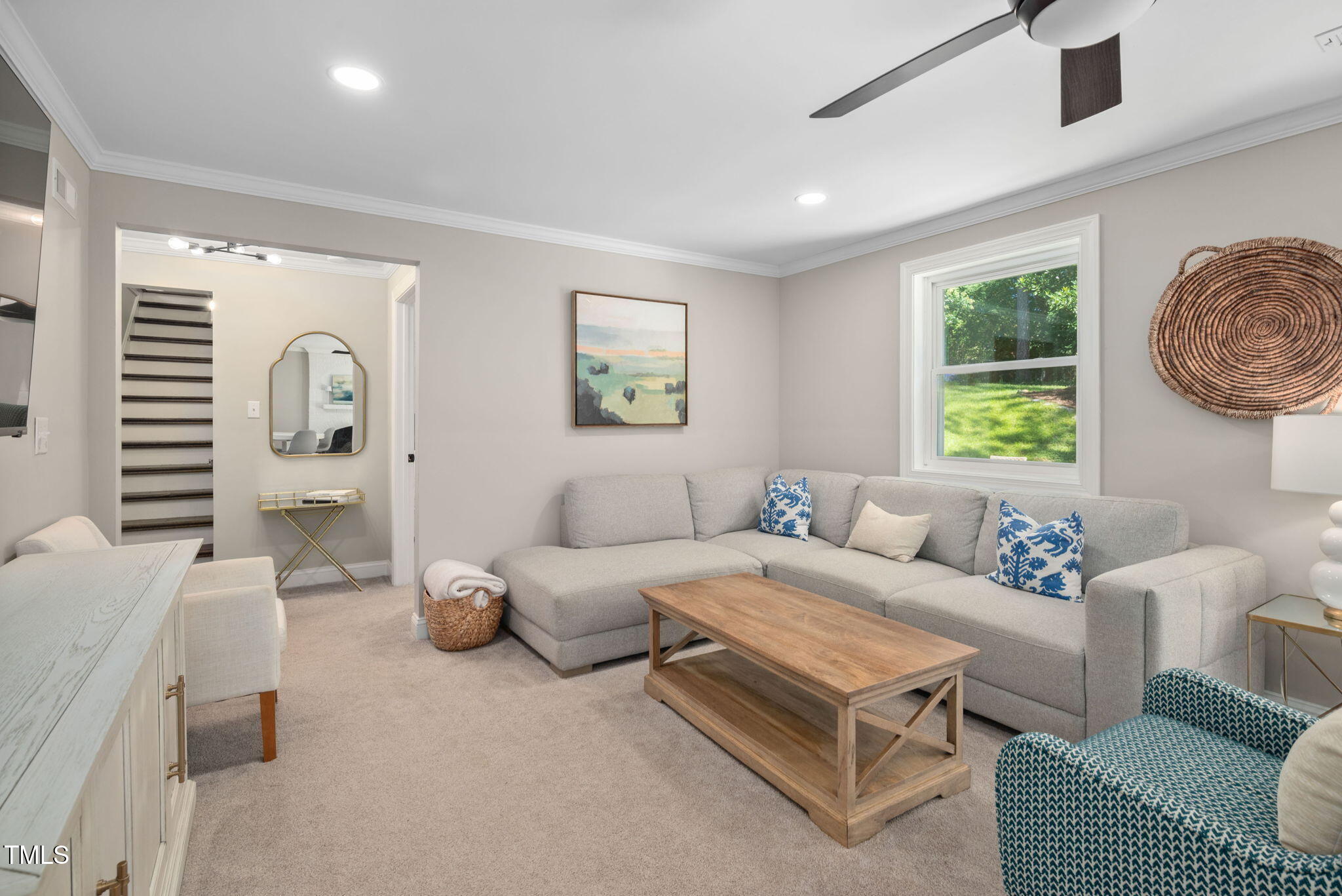 4808 Latimer Road Raleigh, NC 27609 - Photo 29 of 39 a living room with furniture and a window